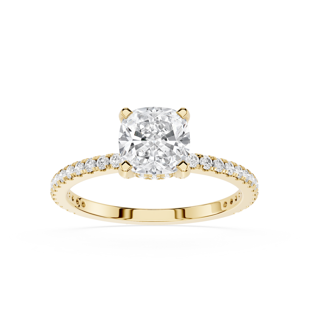 Gold ring with a large diamond and smaller diamonds on the band against a white background
