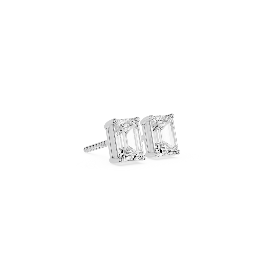 Pair of diamond stud earrings on a white background