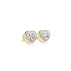 Heart-shaped diamond earrings with gold settings on a white background