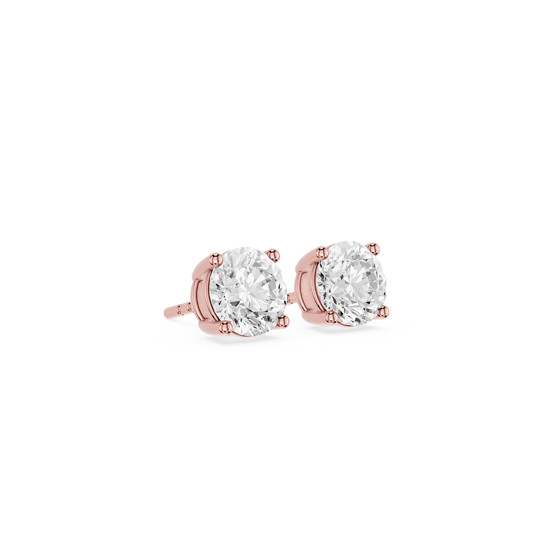 Rose gold earrings with clear gemstones on a white background