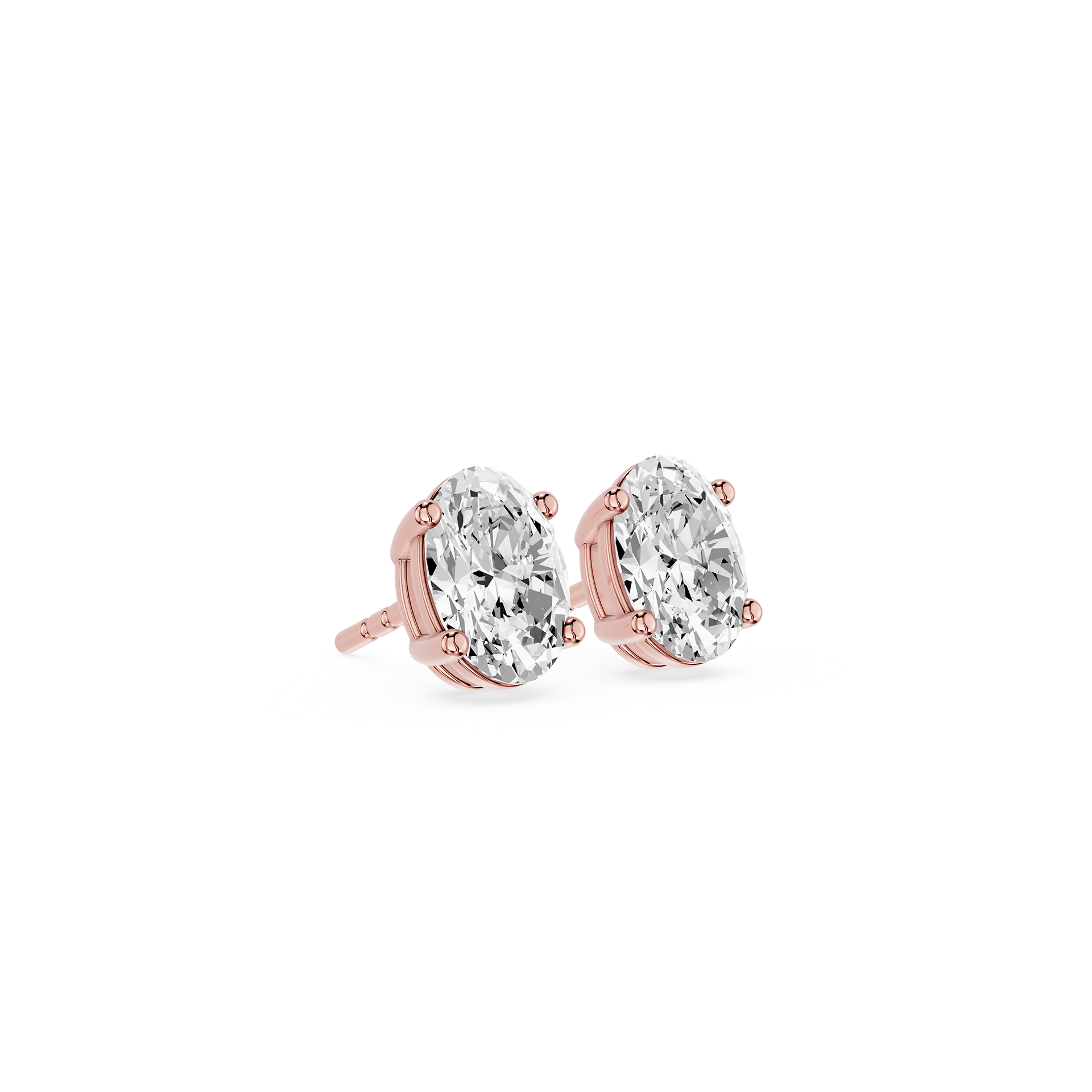 Rose gold earrings with clear gemstones on a white background