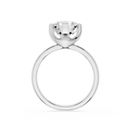 Silver ring with a clear gemstone on a white background