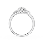 Silver ring with a central diamond and smaller stones on a white background