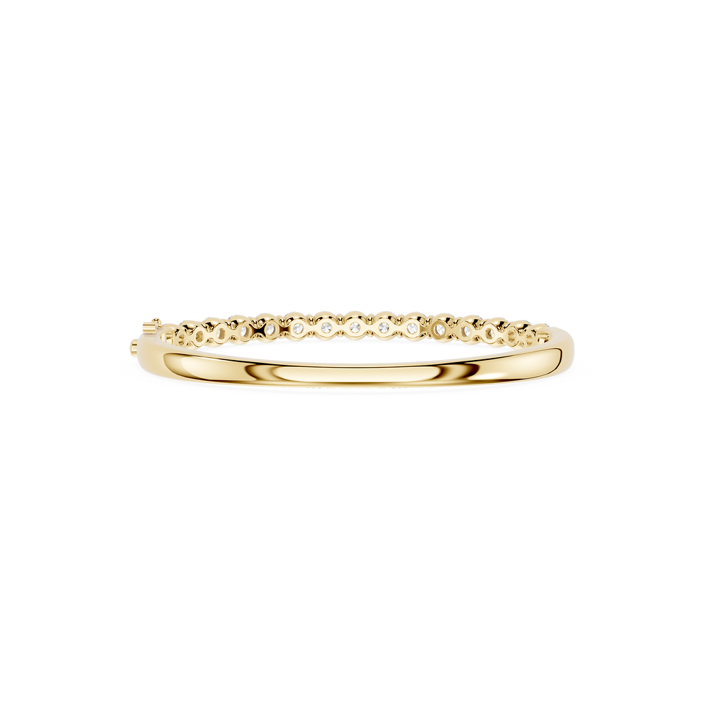 Gold ring with small diamonds on a white background