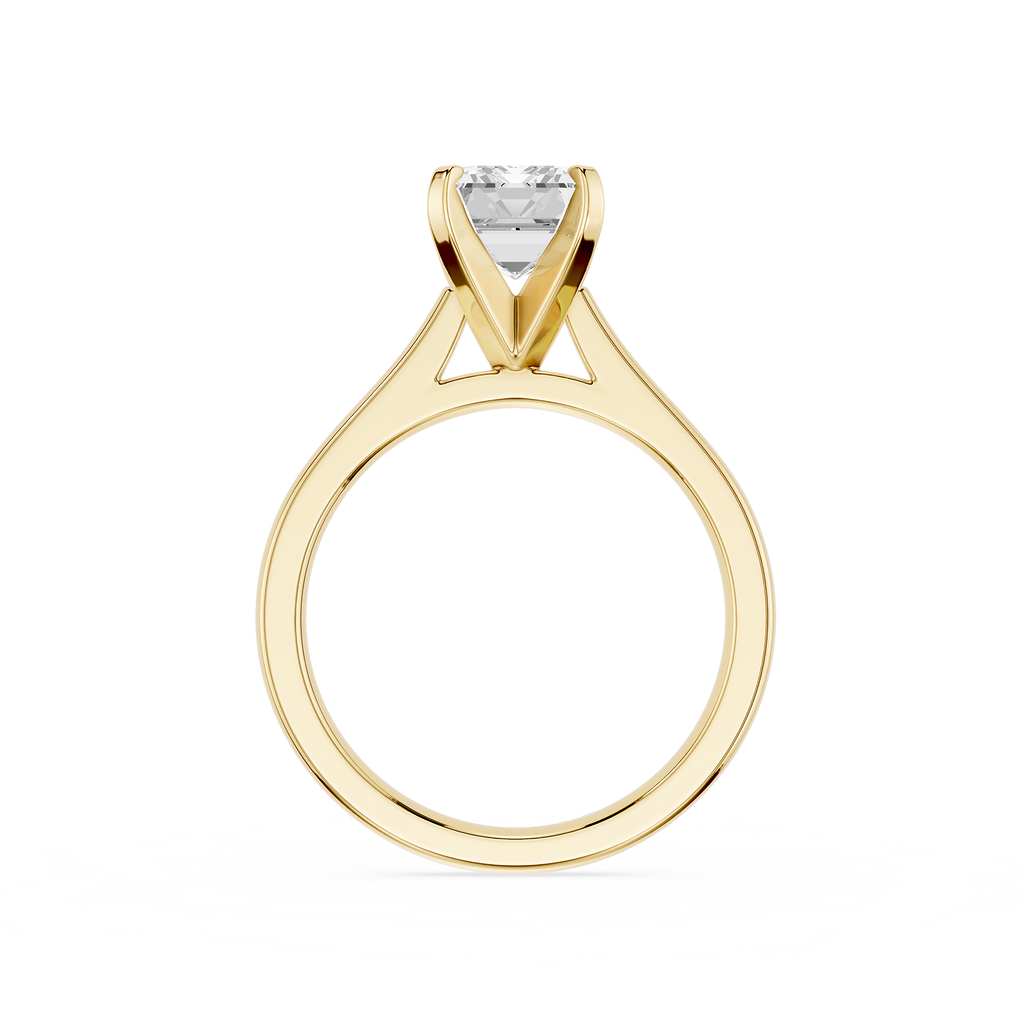 Gold ring with a diamond on a white background