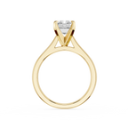 Gold ring with a diamond on a white background