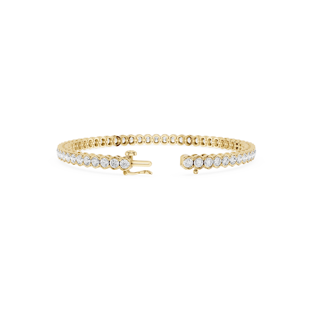 Gold bracelet with anchor charm on a white background