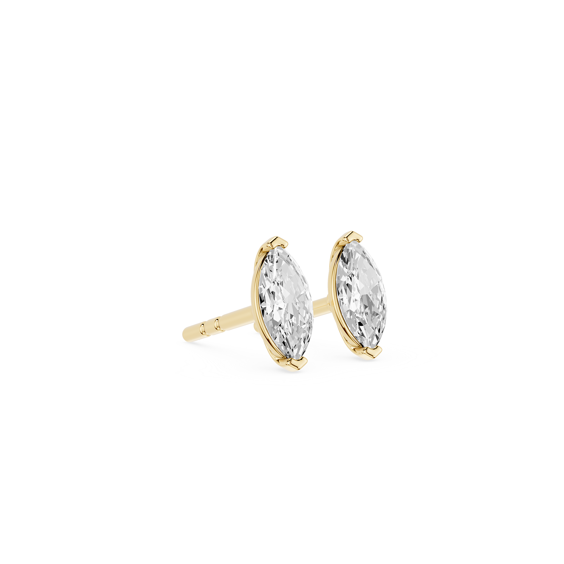Gold earrings with clear gemstones on a white background