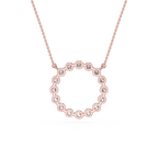 Rose gold necklace with a heart-shaped pendant on a white background
