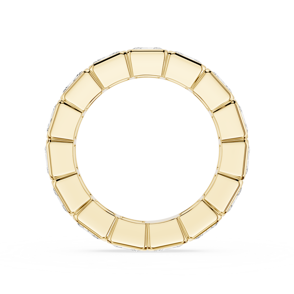 A gold segmented ring with a circular design, featuring a polished finish and a subtle shadow beneath, set against a plain white background.