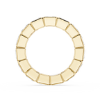 A gold segmented ring with a circular design, featuring a polished finish and a subtle shadow beneath, set against a plain white background.