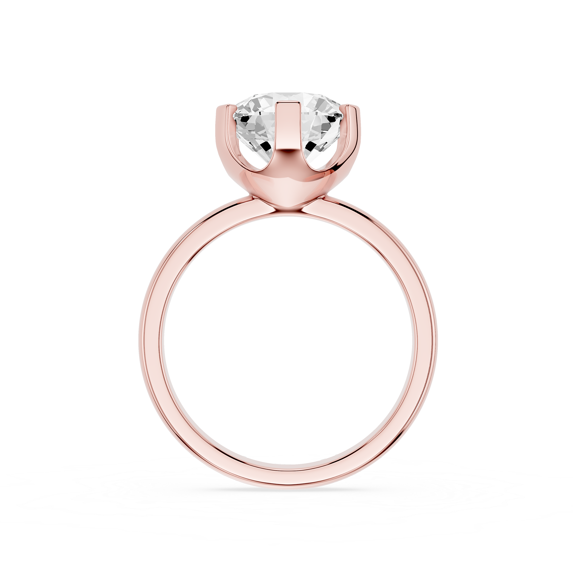 Rose gold ring with a clear gemstone on a white background