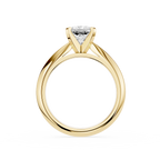 Gold ring with a diamond on a white background