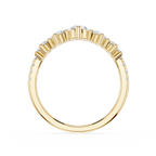 Gold ring with diamond accents on a white background