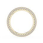 Gold ring with small diamonds on a white background
