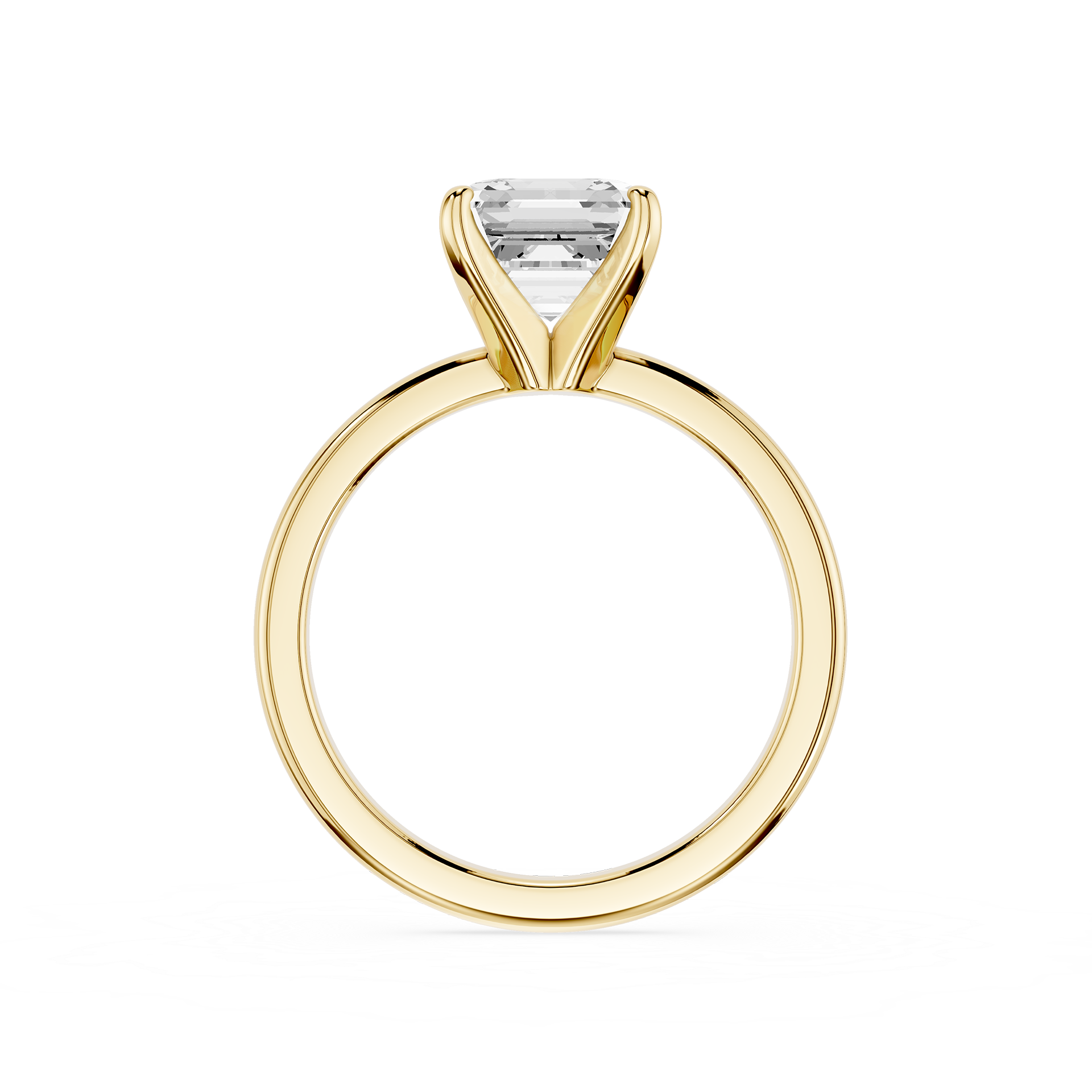 Gold ring with a clear gemstone on a white background
