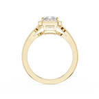 Gold ring with a diamond on a white background