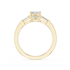 Gold ring with a diamond on a white background