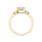 Gold ring with diamond accents on a white background