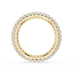 Gold ring with diamond accents on a white background