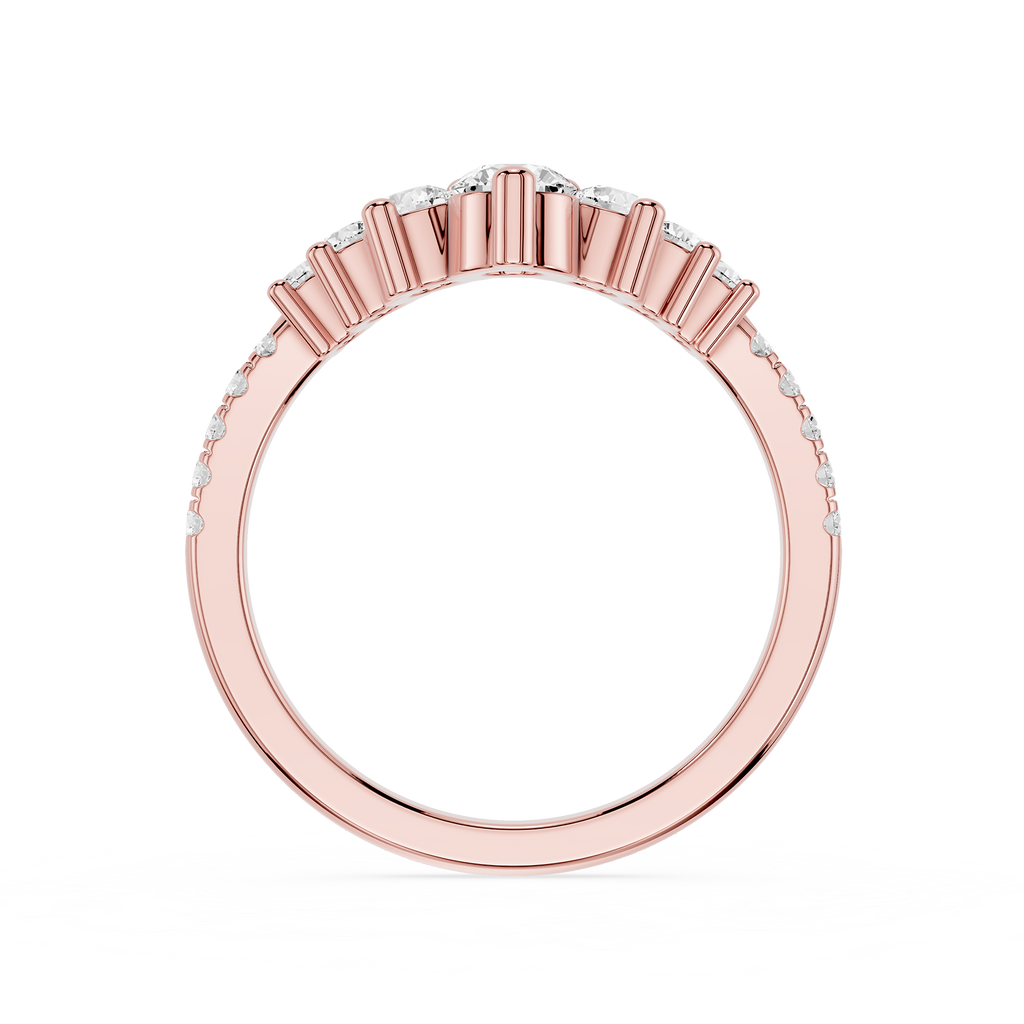 Rose gold ring with small diamonds on a white background