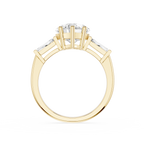 Gold ring with a diamond on a white background