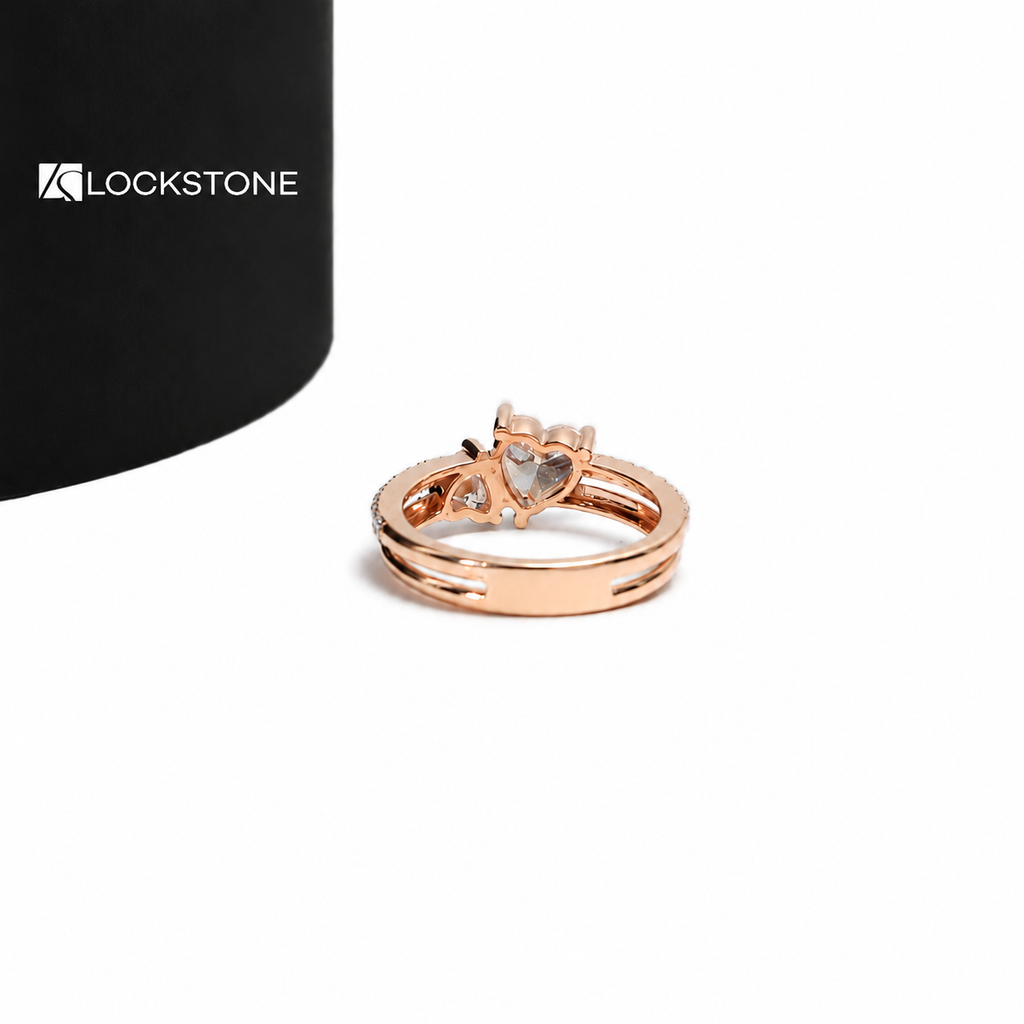 A rose gold wedding ring stack with heart shaped diamond center stones, polished curved band and round diamond accents