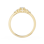 Gold ring with diamonds on a white background