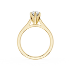 Gold ring with a diamond on a white background