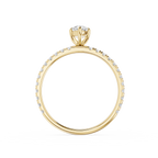 Gold ring with diamond accents on a white background