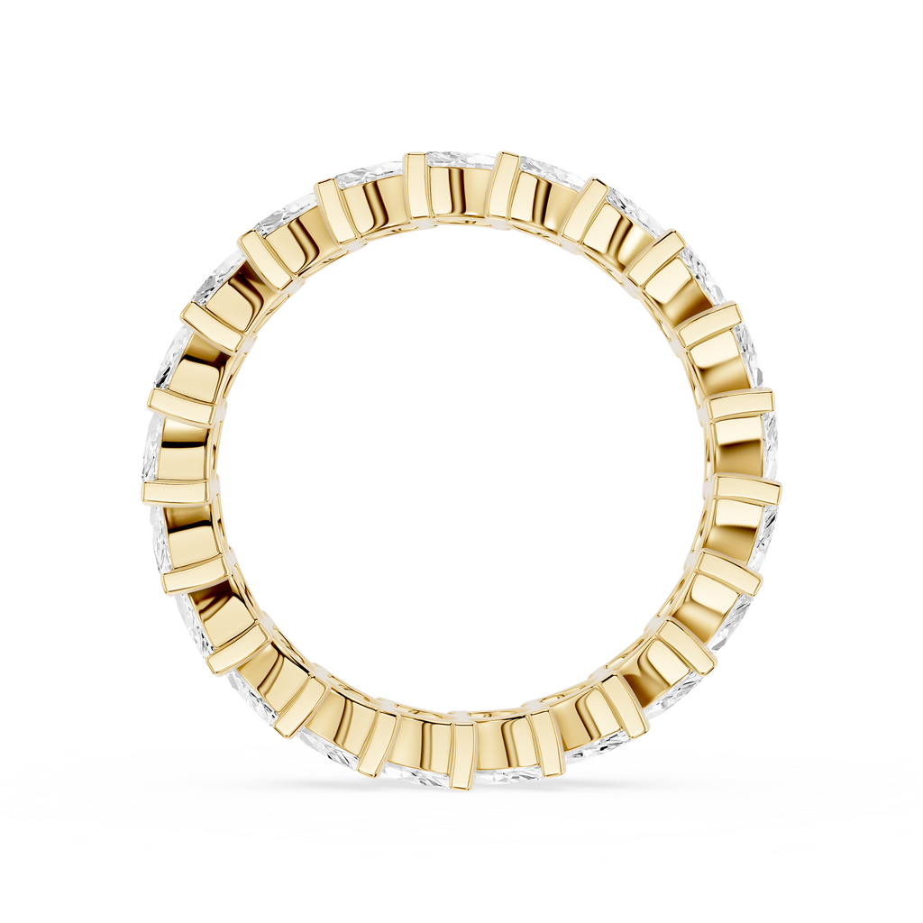 Gold ring with diamond accents on a white background