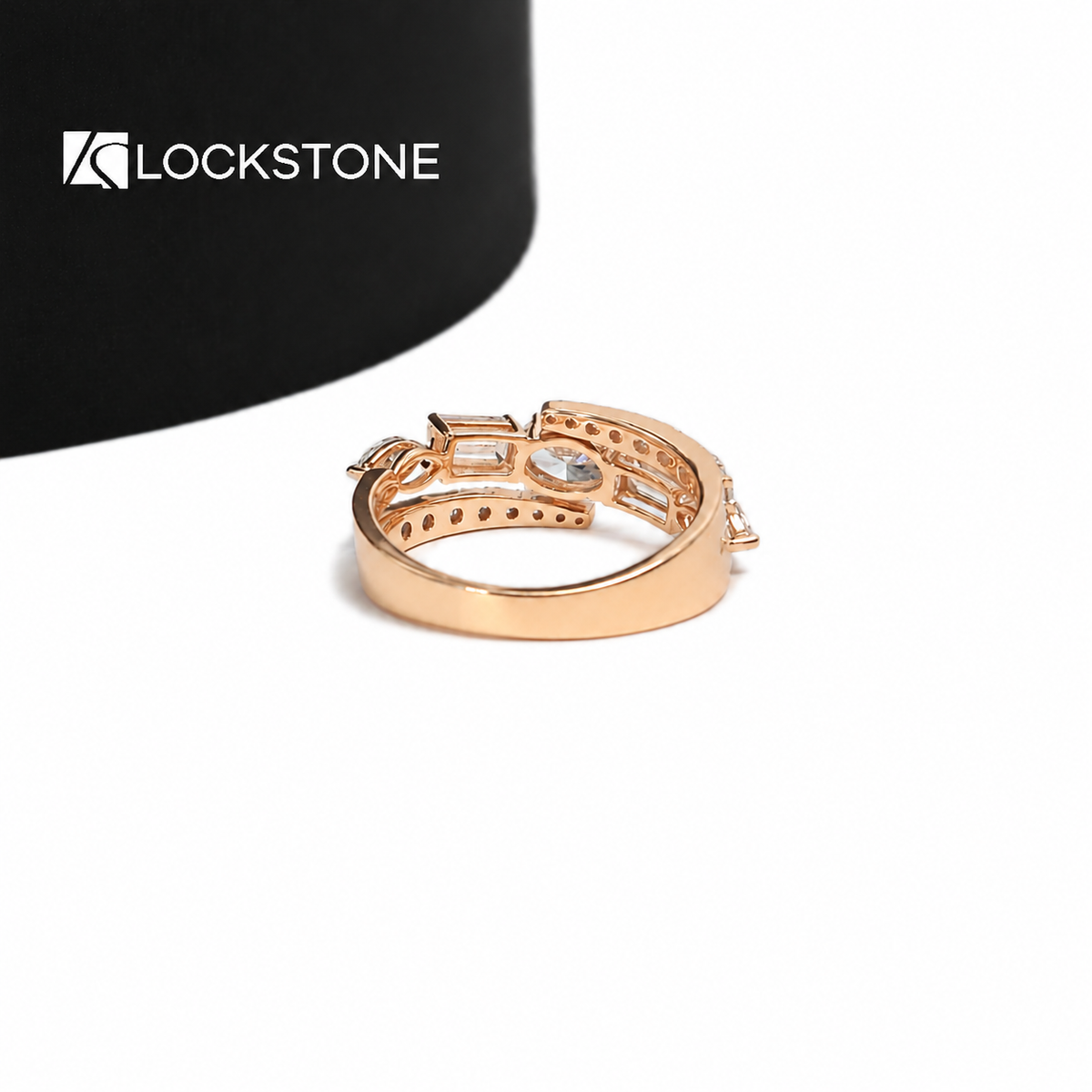 Multi shape lab grown diamond statement ring in rose gold showcasing an oval centerpiece and asymmetrical open band design