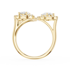 Gold ring with three diamonds on a white background