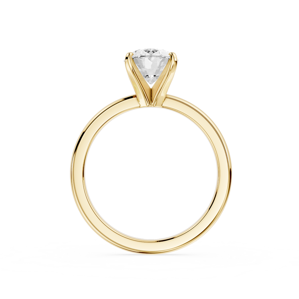 Gold ring with a diamond on a white background
