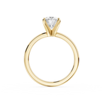 Gold ring with a diamond on a white background