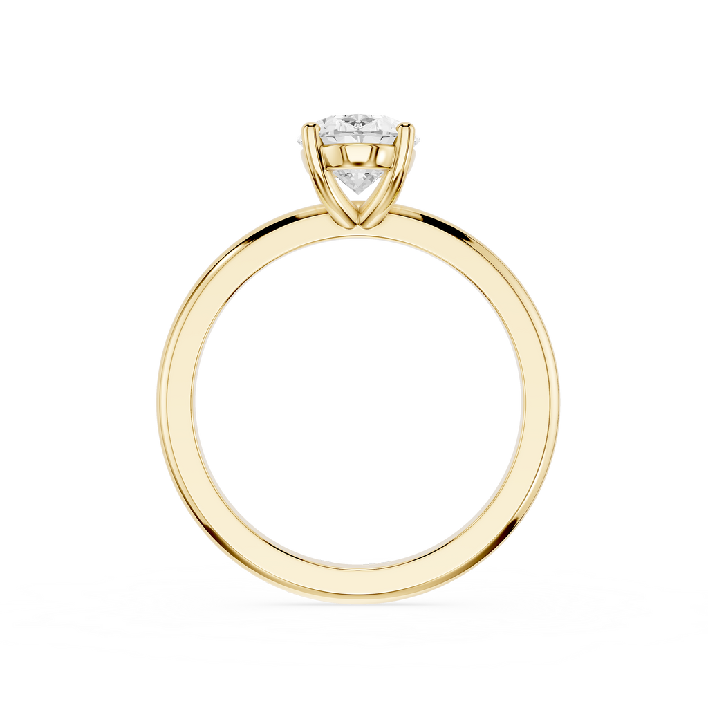 Gold ring with a diamond on a white background
