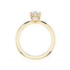 Gold ring with a diamond on a white background