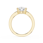 Gold ring with a diamond on a white background