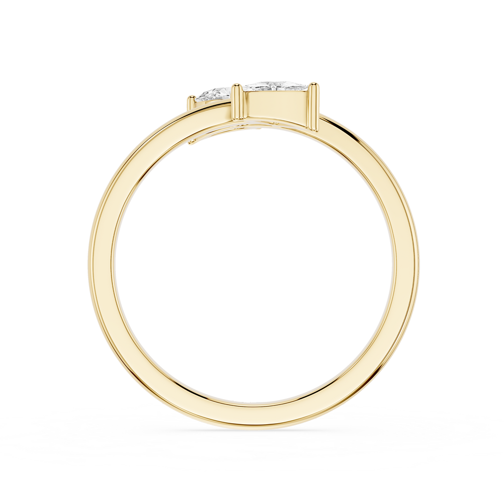 A yellow gold ring with a three-stone setting, featuring clear gemstones, shown from a side profile view on a white background.