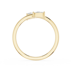 A yellow gold ring with a three-stone setting, featuring clear gemstones, shown from a side profile view on a white background.