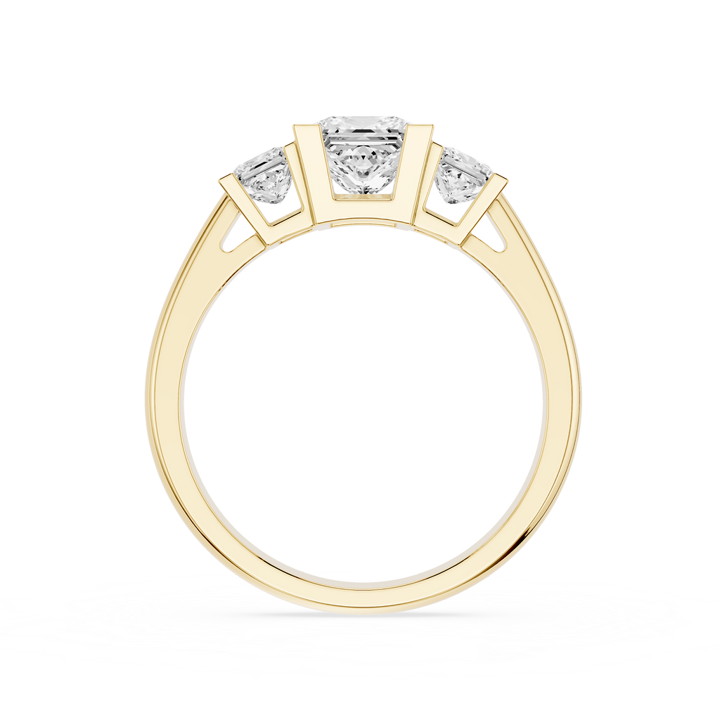 Gold ring with three diamonds on a white background