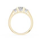 Gold ring with three diamonds on a white background