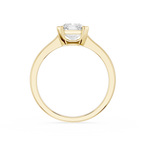 Gold ring with a diamond on a white background