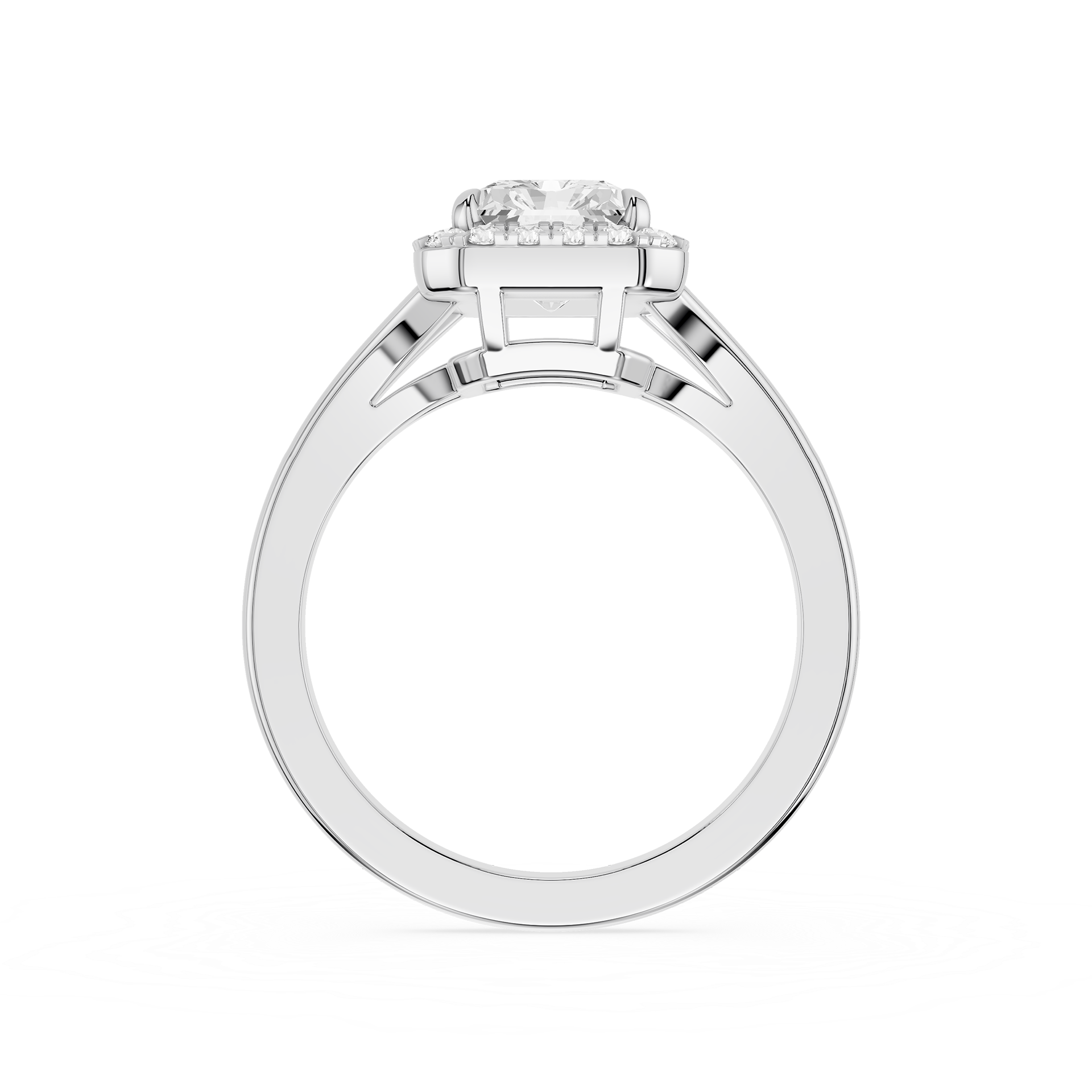 Silver ring with intricate design on a white background
