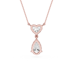 Rose gold necklace with heart and teardrop-shaped diamond pendants on a white background