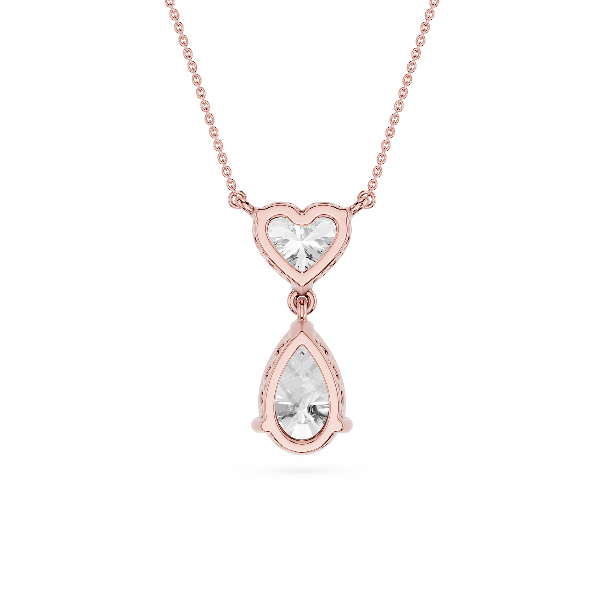 Rose gold necklace with heart and teardrop-shaped diamond pendants on a white background