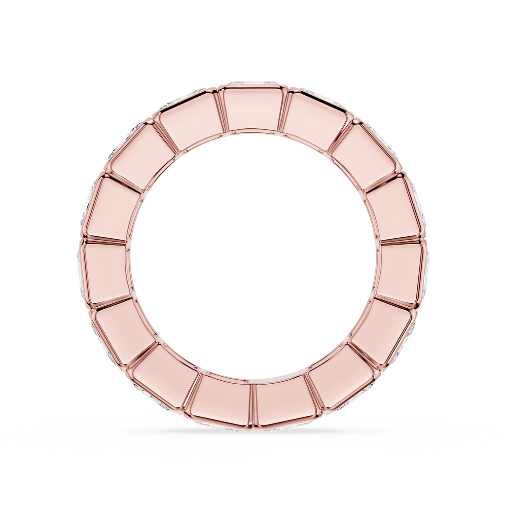 A yellow gold eternity ring featuring a continuous row of small, scalloped-cut clear gemstones, presented on a clean white background.