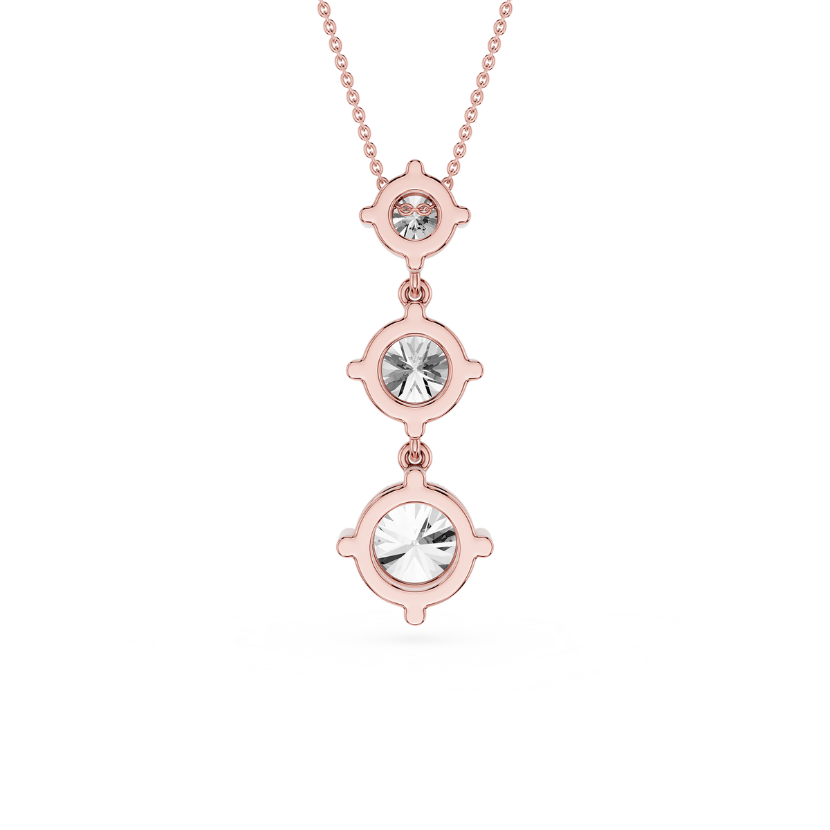 Rose gold necklace with three crystal stones on a white background