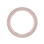 Rose gold ring with small diamonds on a white background
