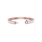 Rose gold bracelet with clear gemstones on a white background
